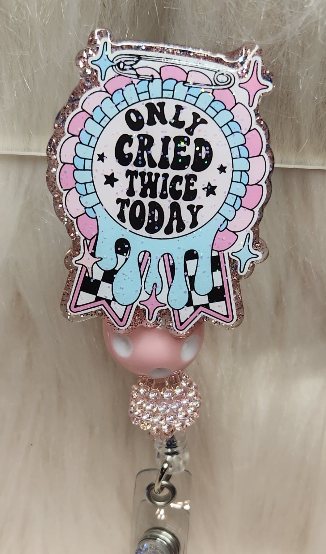 Only Cried Twice Badge Reel Face
