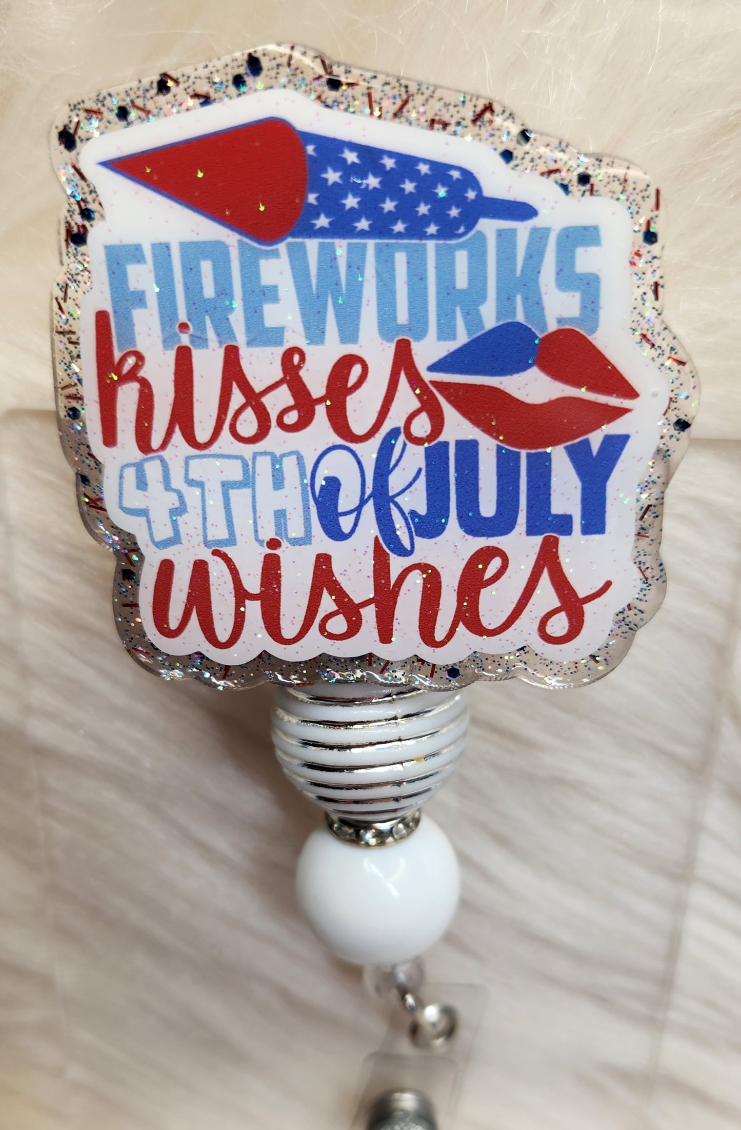 Fireworks Kisses Badge Reel Face