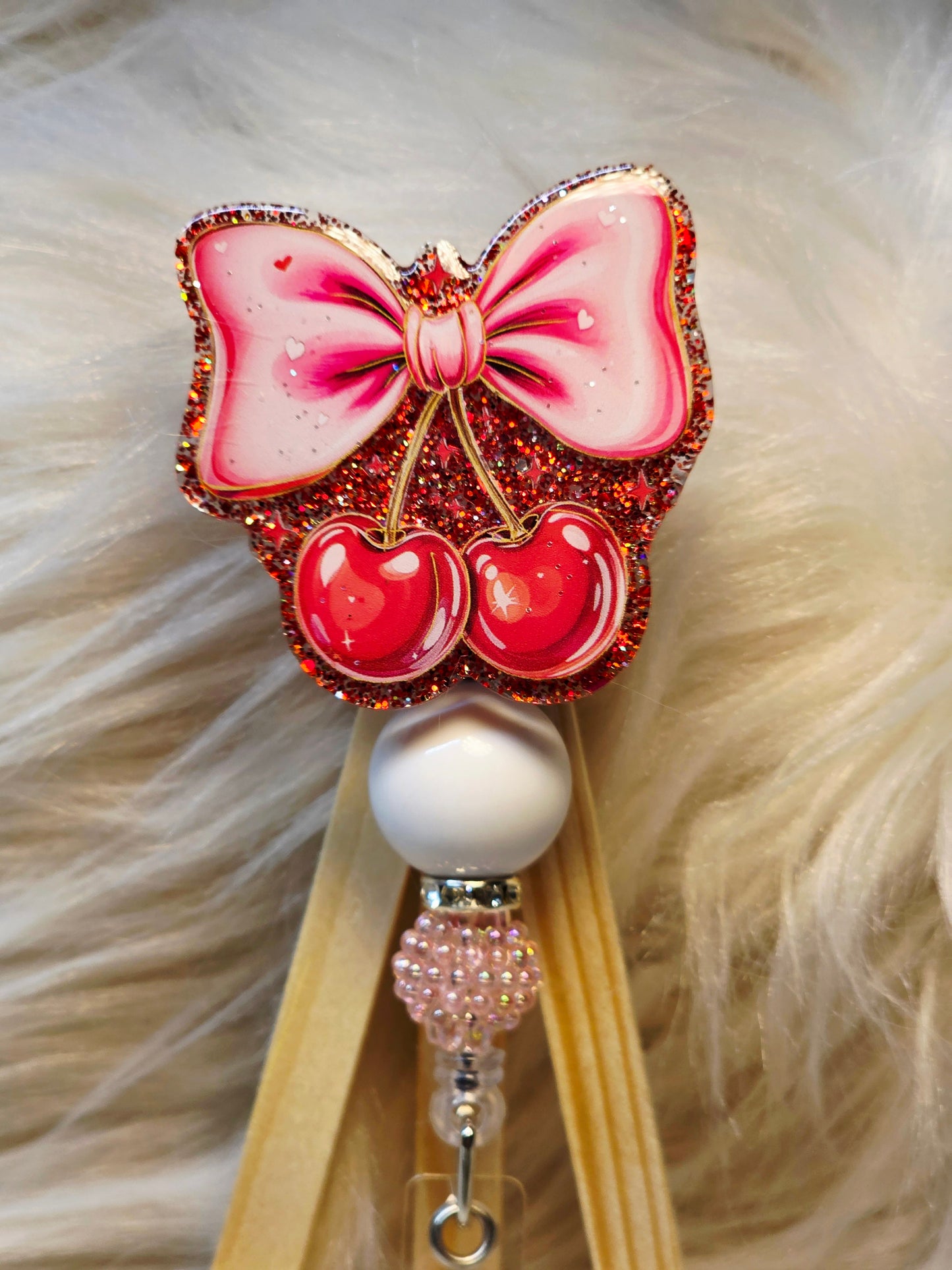 Cherries With Bow Badge Reel Face
