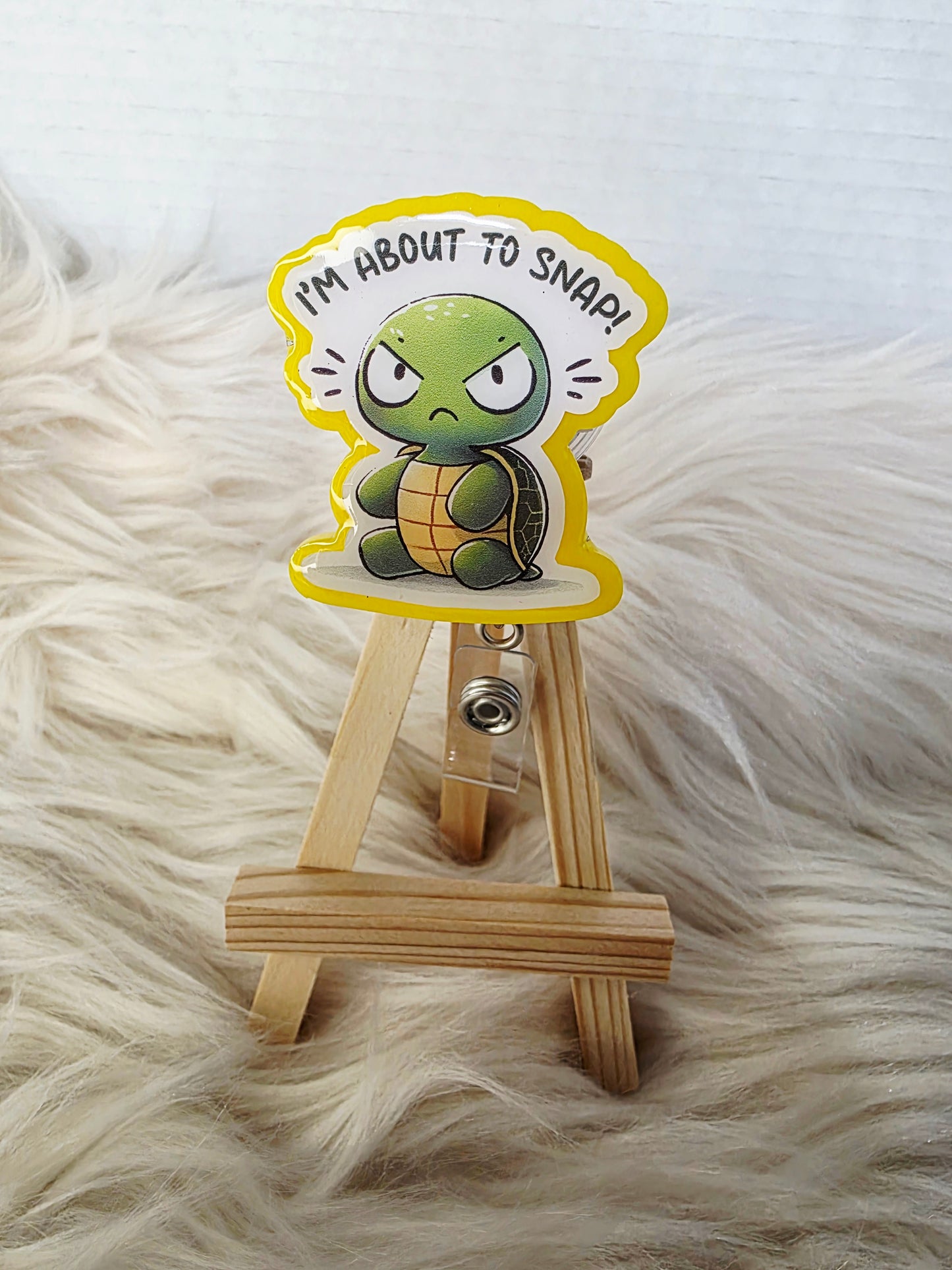 About to Snap Badge Reel Face