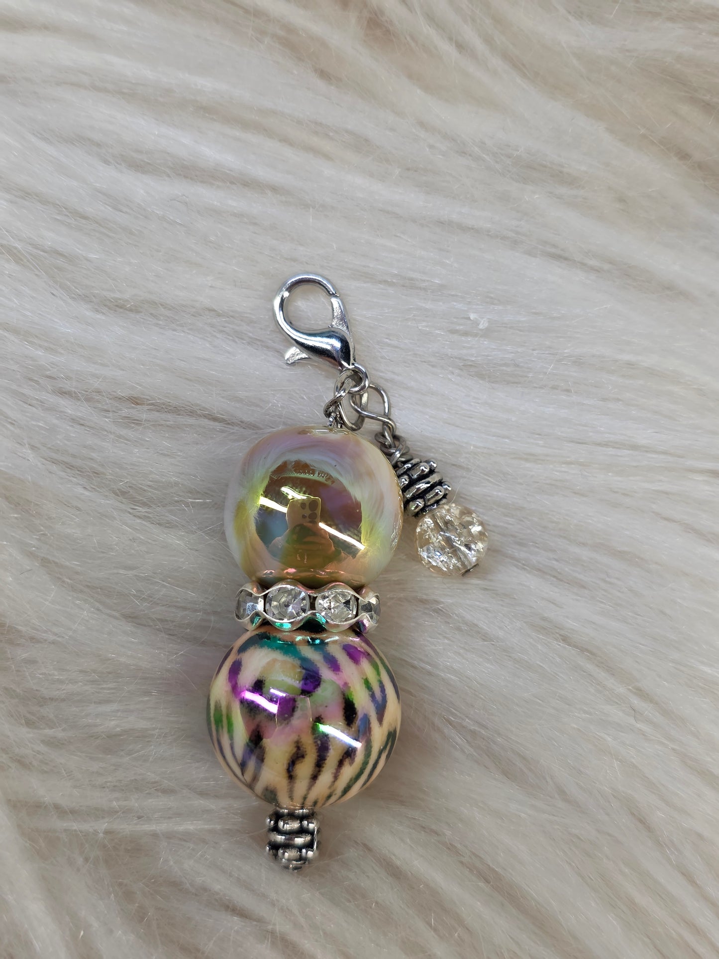Cheetah Badge Reel Charm