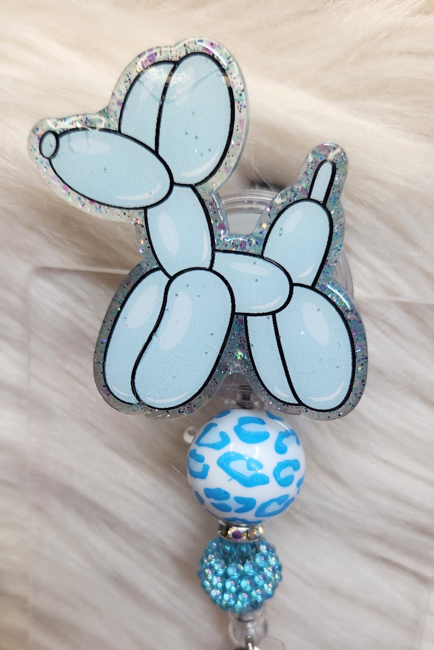 Balloon Dog Blue Badge Reel Face