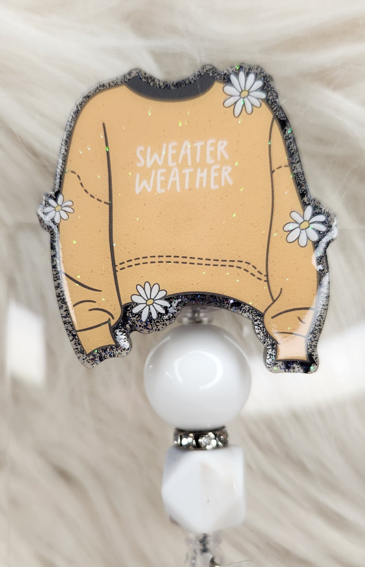 Sweater Weather Badge Reel Face