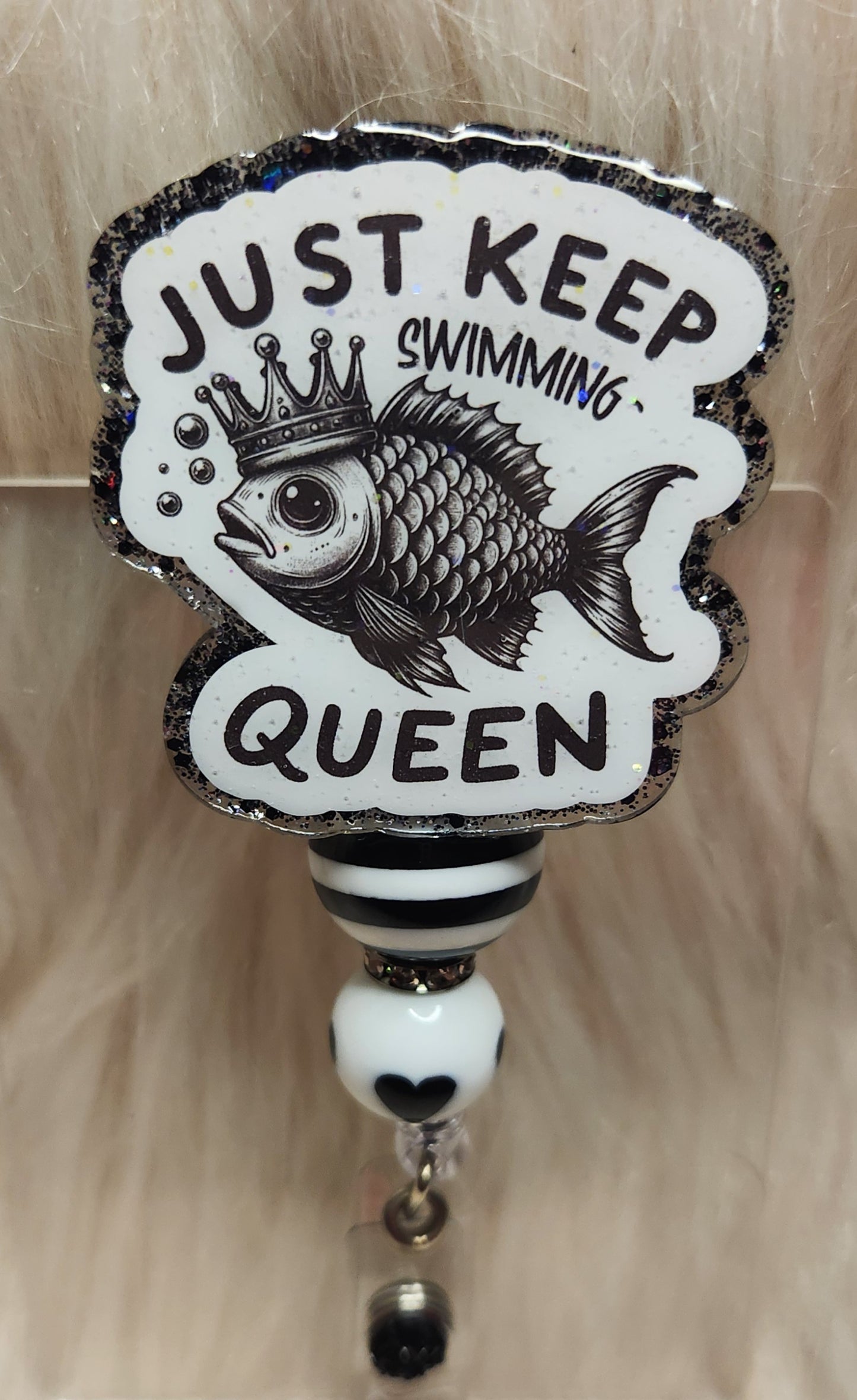 Keep Swimming Badge Reel Face