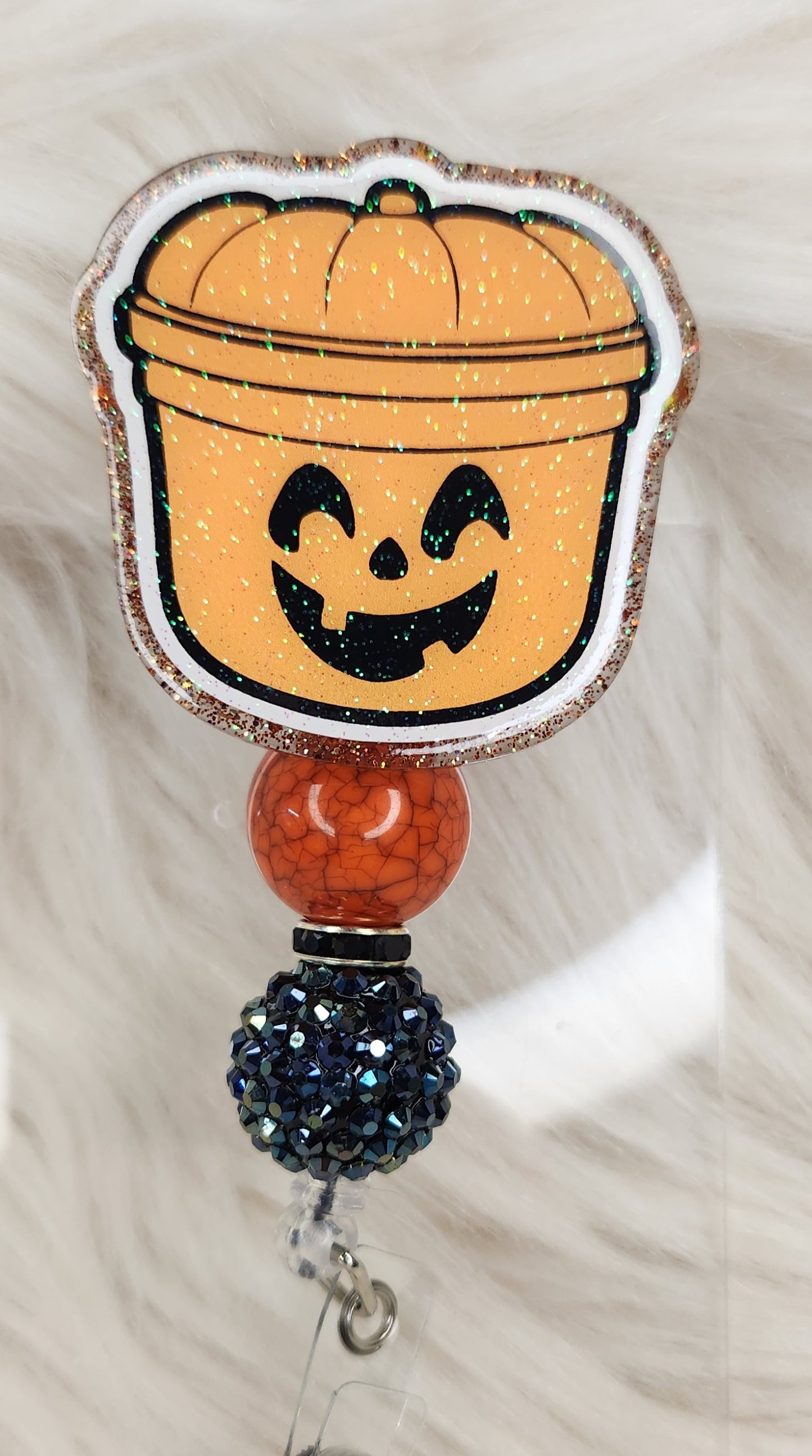 Pumpkin Bucket Badge Reel Face