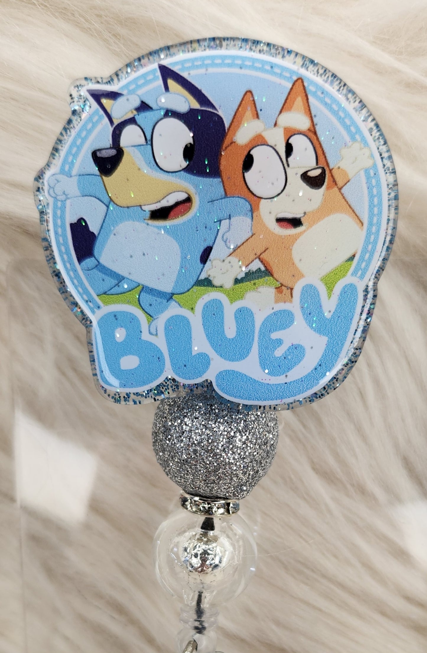 Blue Dog and Friend Badge Reel Face