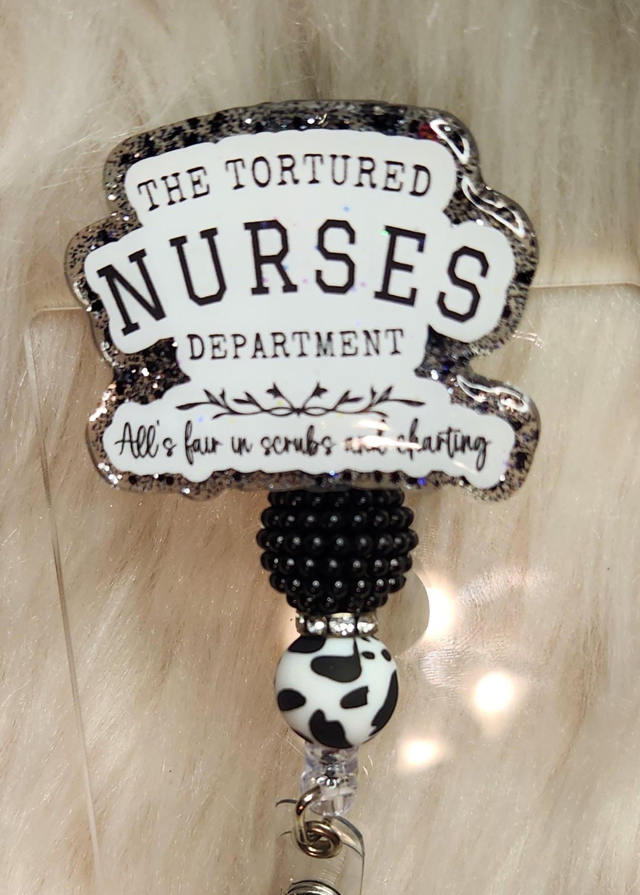 Tortured Nurses Badge Reel Face