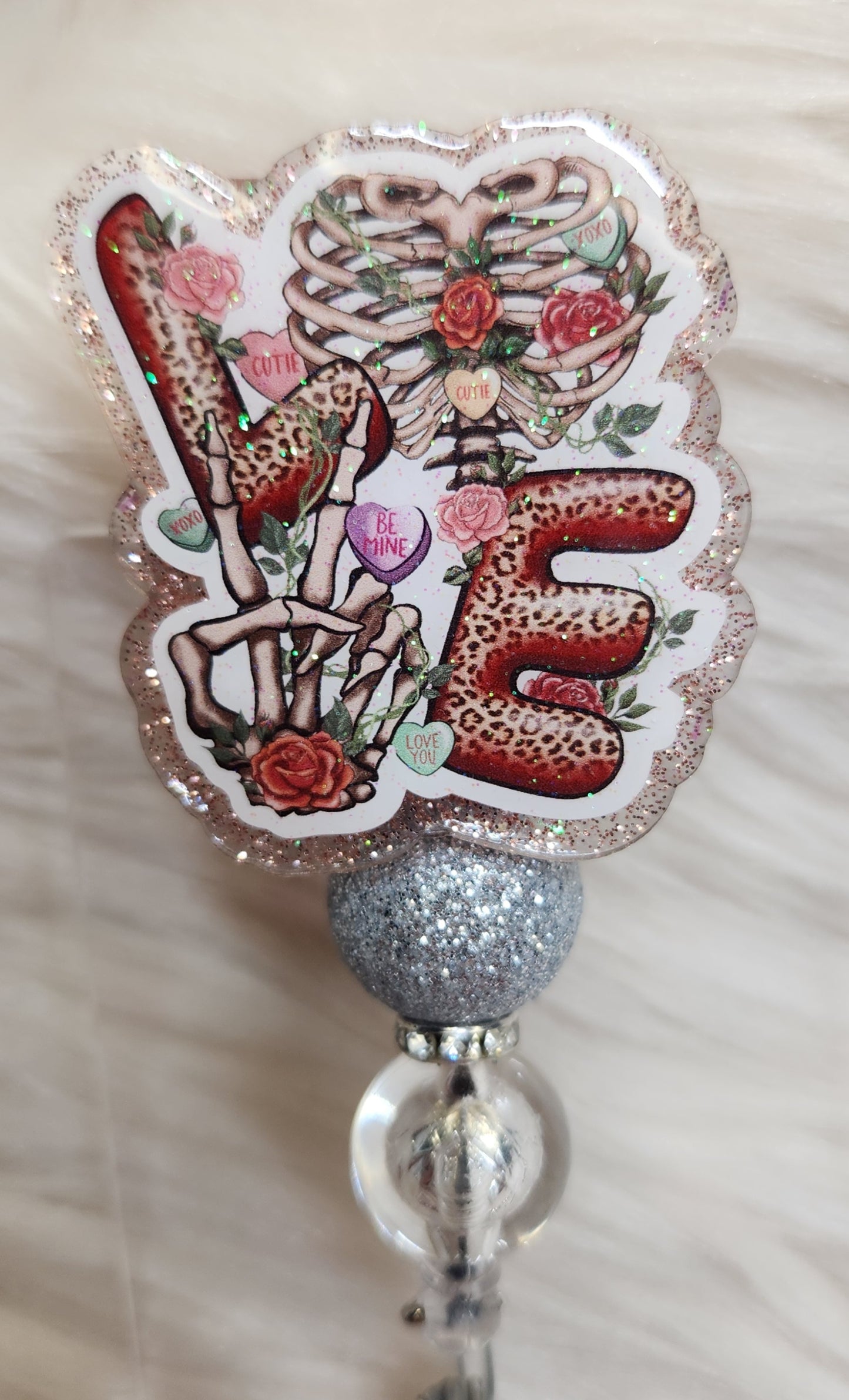 Love Skeleton Badge Reel Face