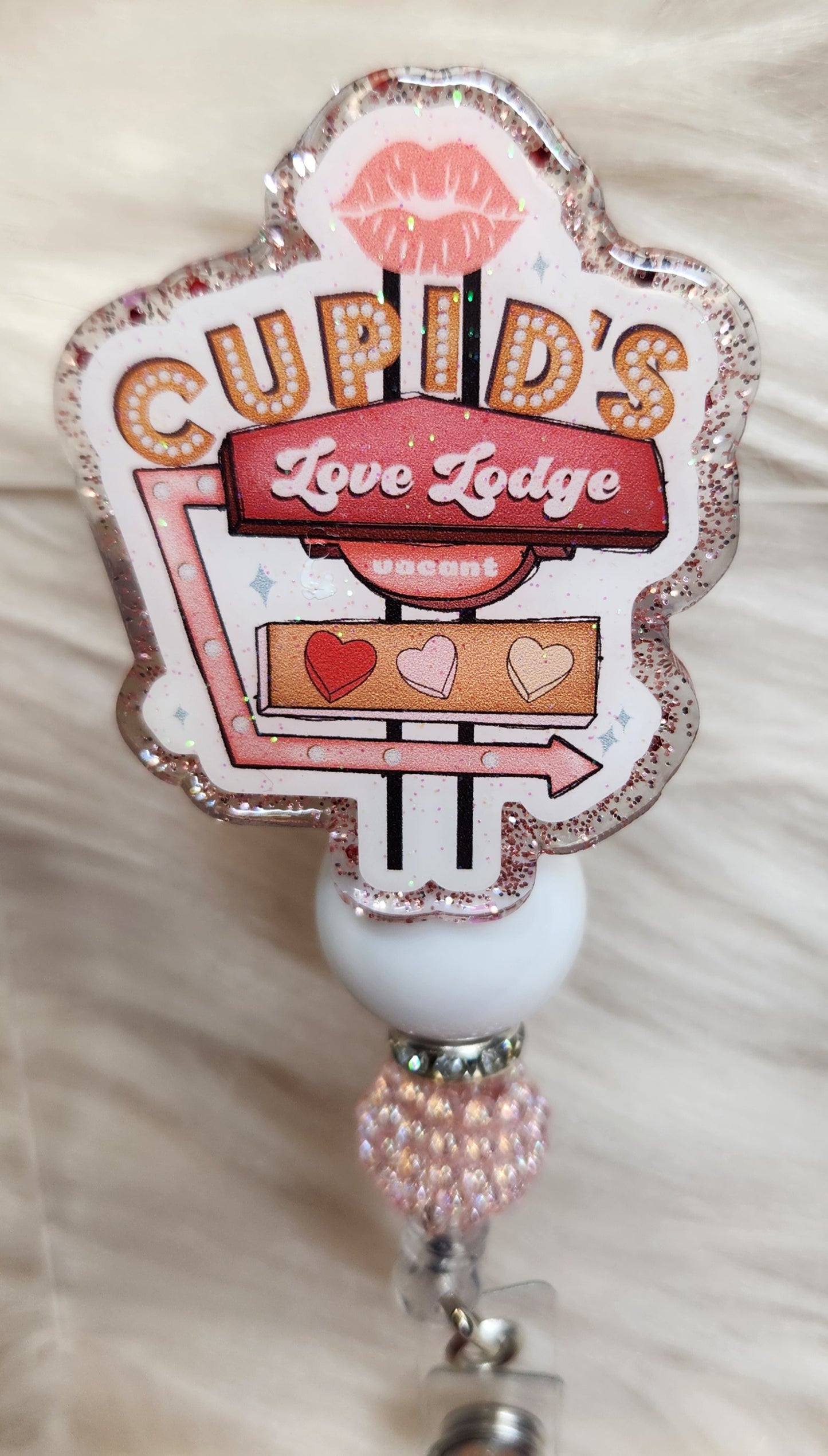 Love Lodge Badge Reel Face