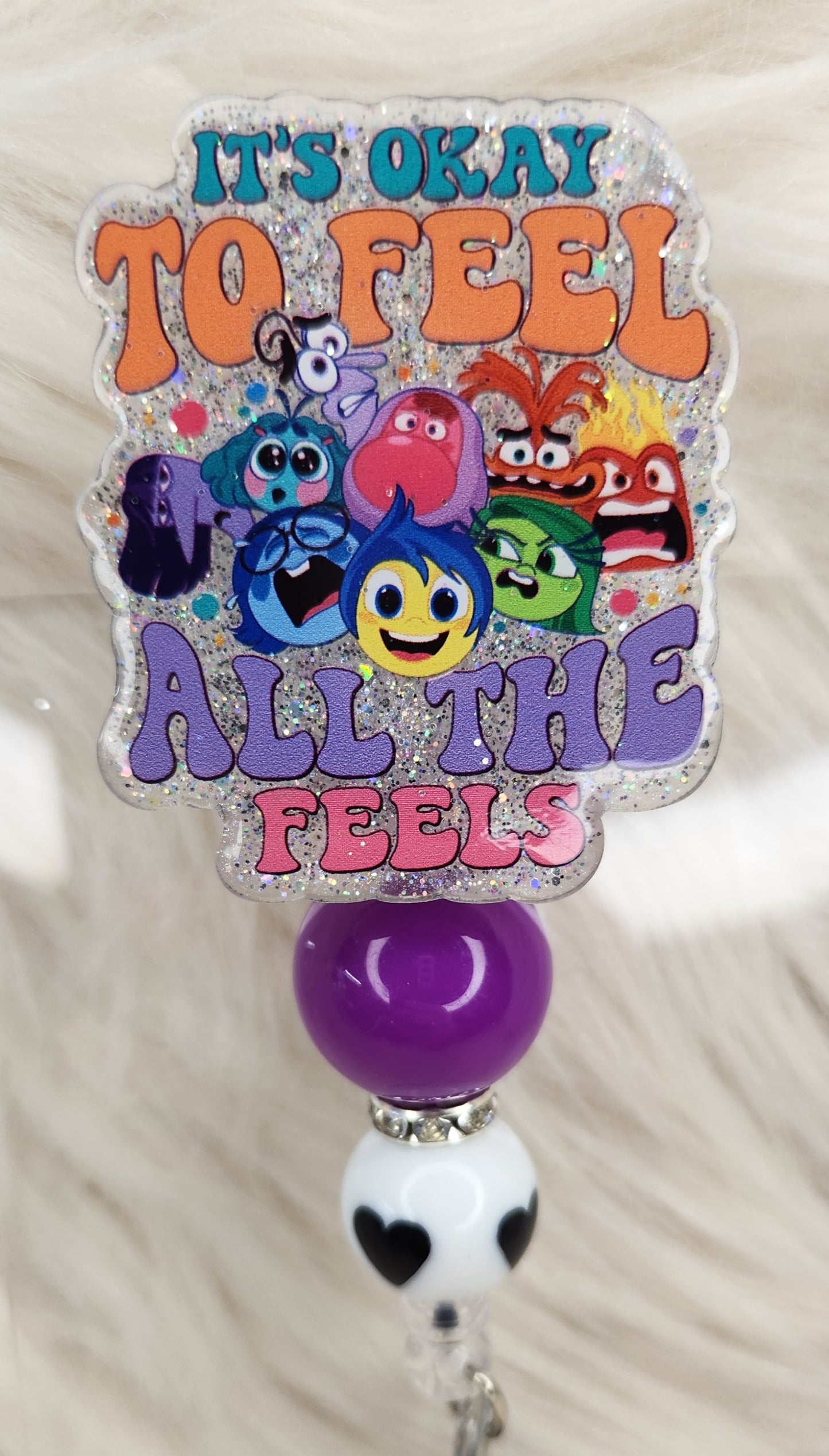 It's OK to Feel Badge Reel Face