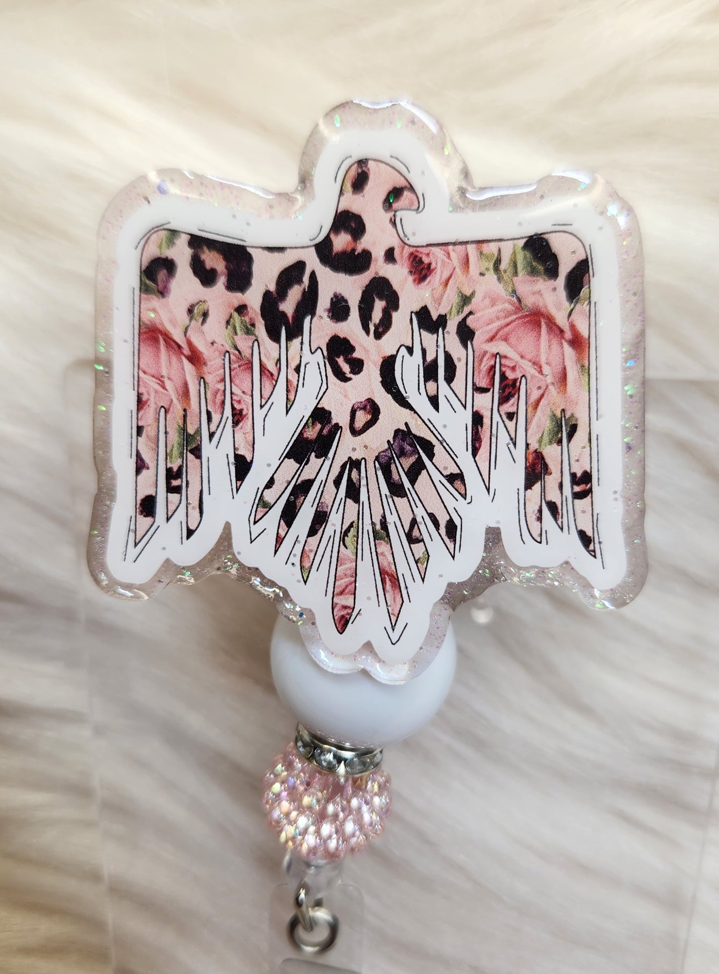 Cheetah Bird Badge Reel Face