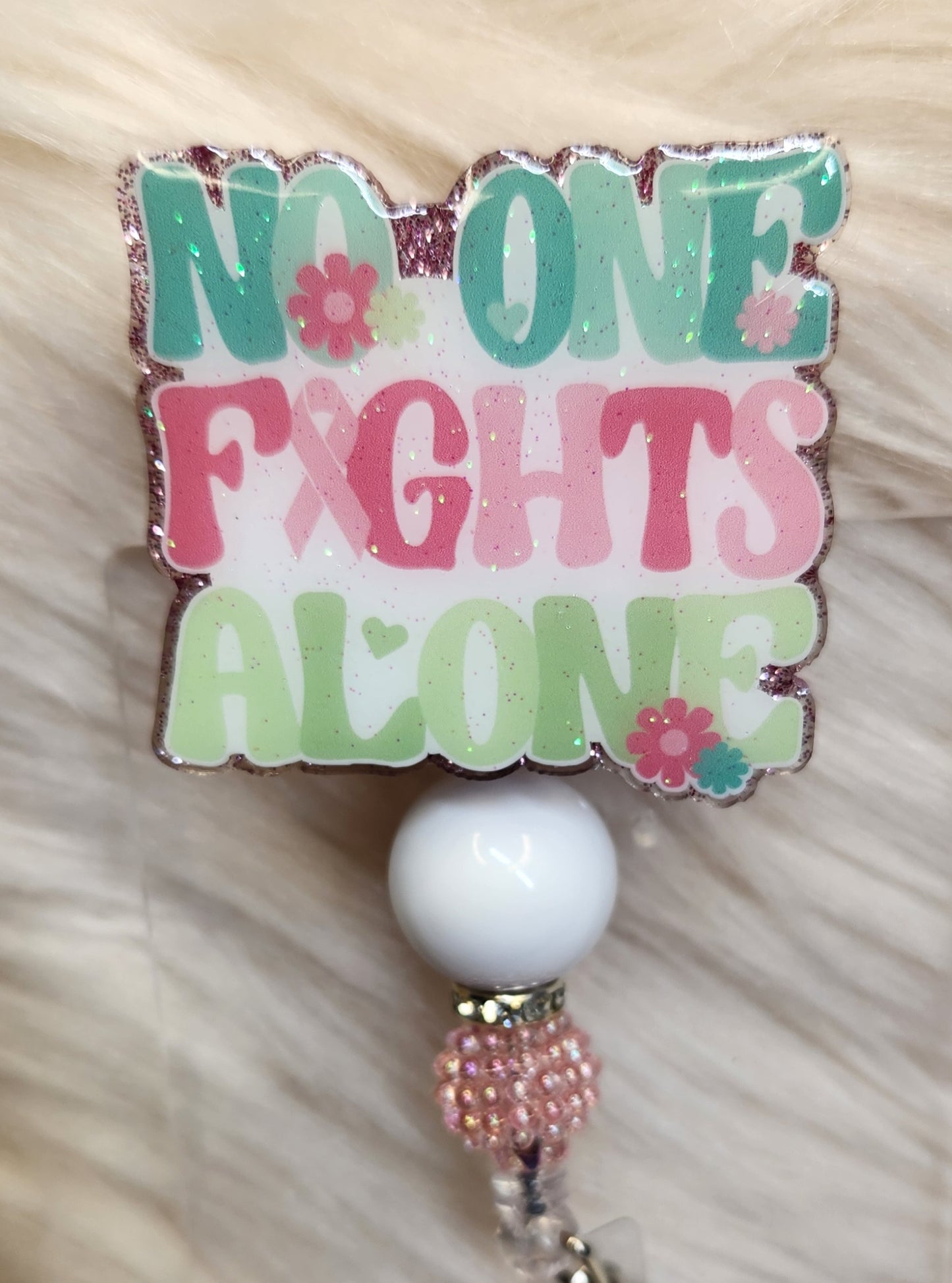 No One Fights Alone Badge Reel Face