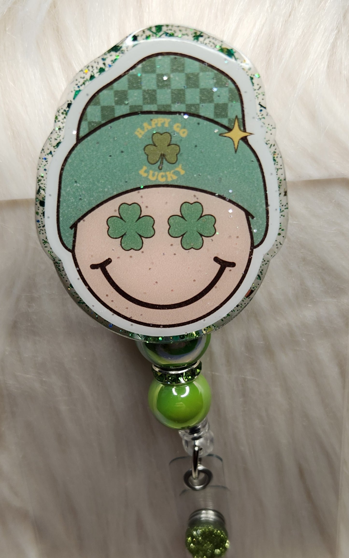 Happy Go Lucky Badge Reel Face