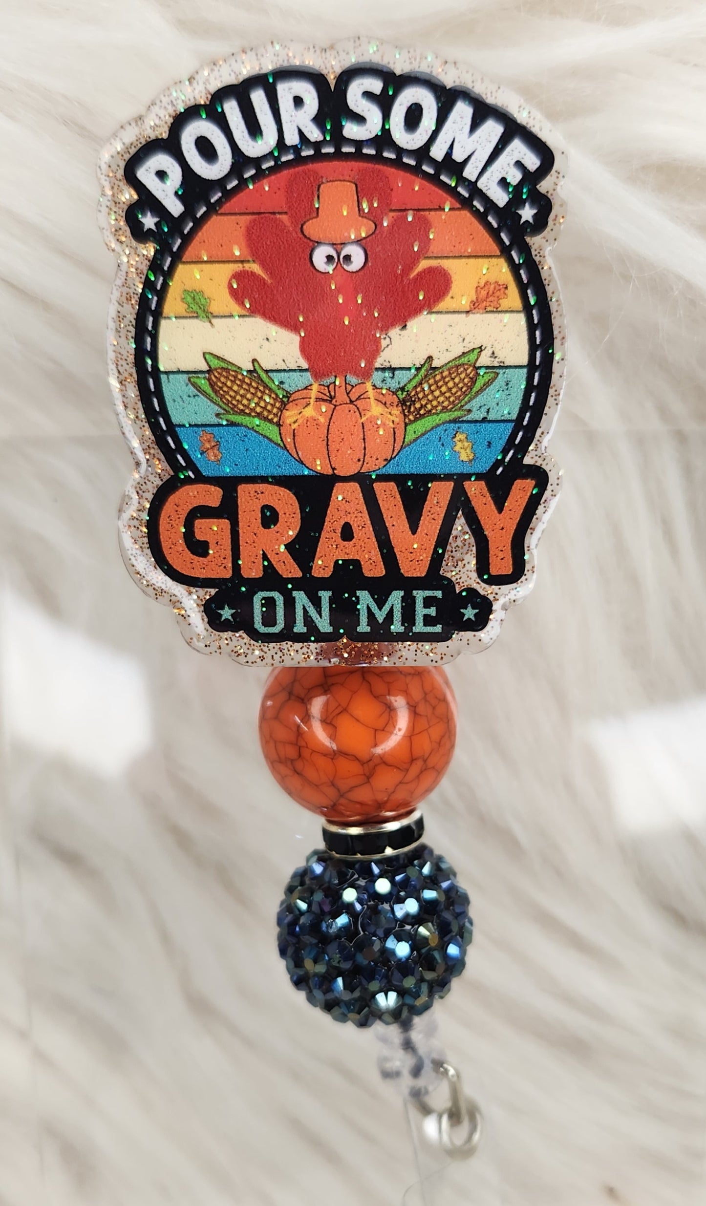 Pour Some Gravy Badge Reel Face