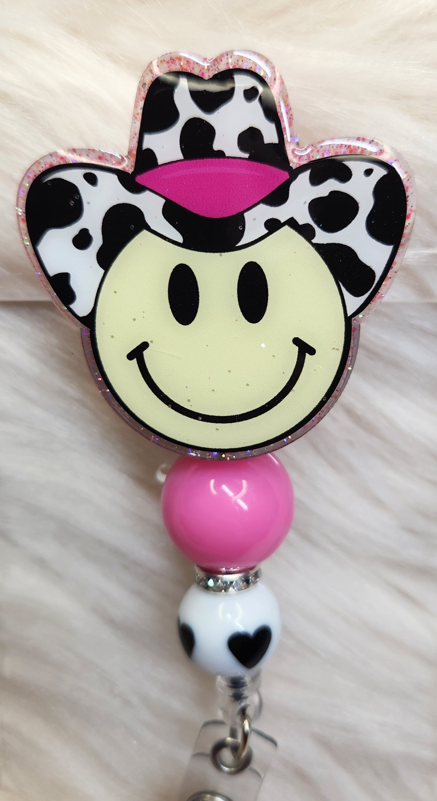Smiley With Hat Badge Reel Face