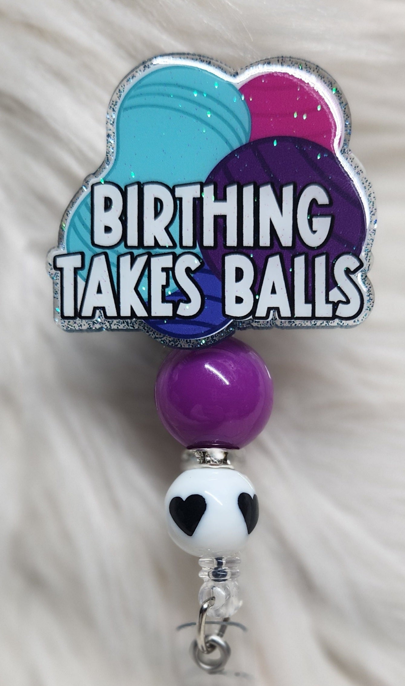Birthing Takes Balls Badge Reel Face