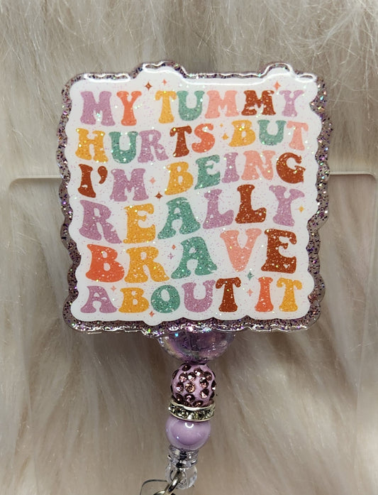 My Tummy Hurts Badge Reel Face