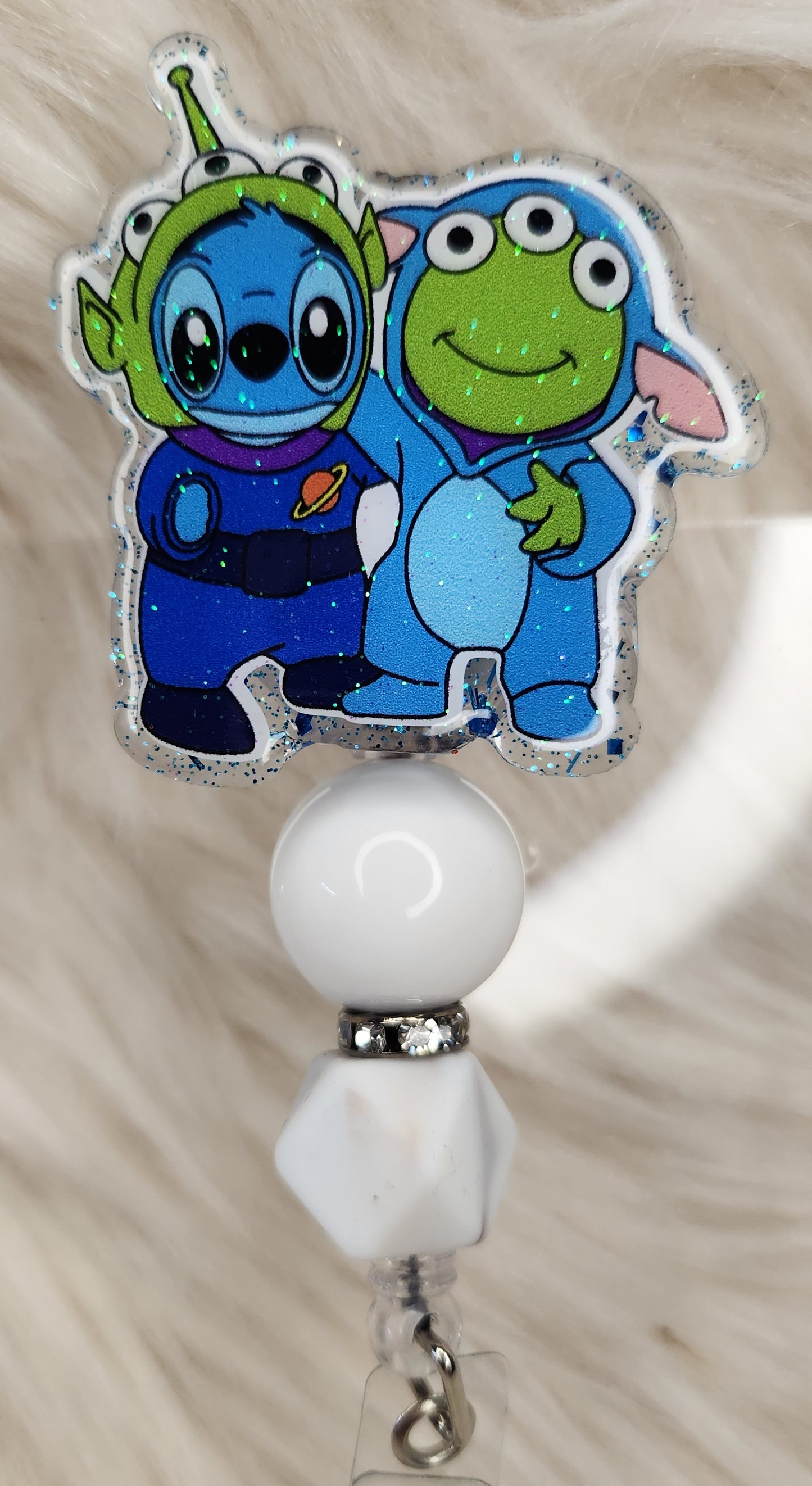 Blue Alien and Alien Friend Badge Reel Face