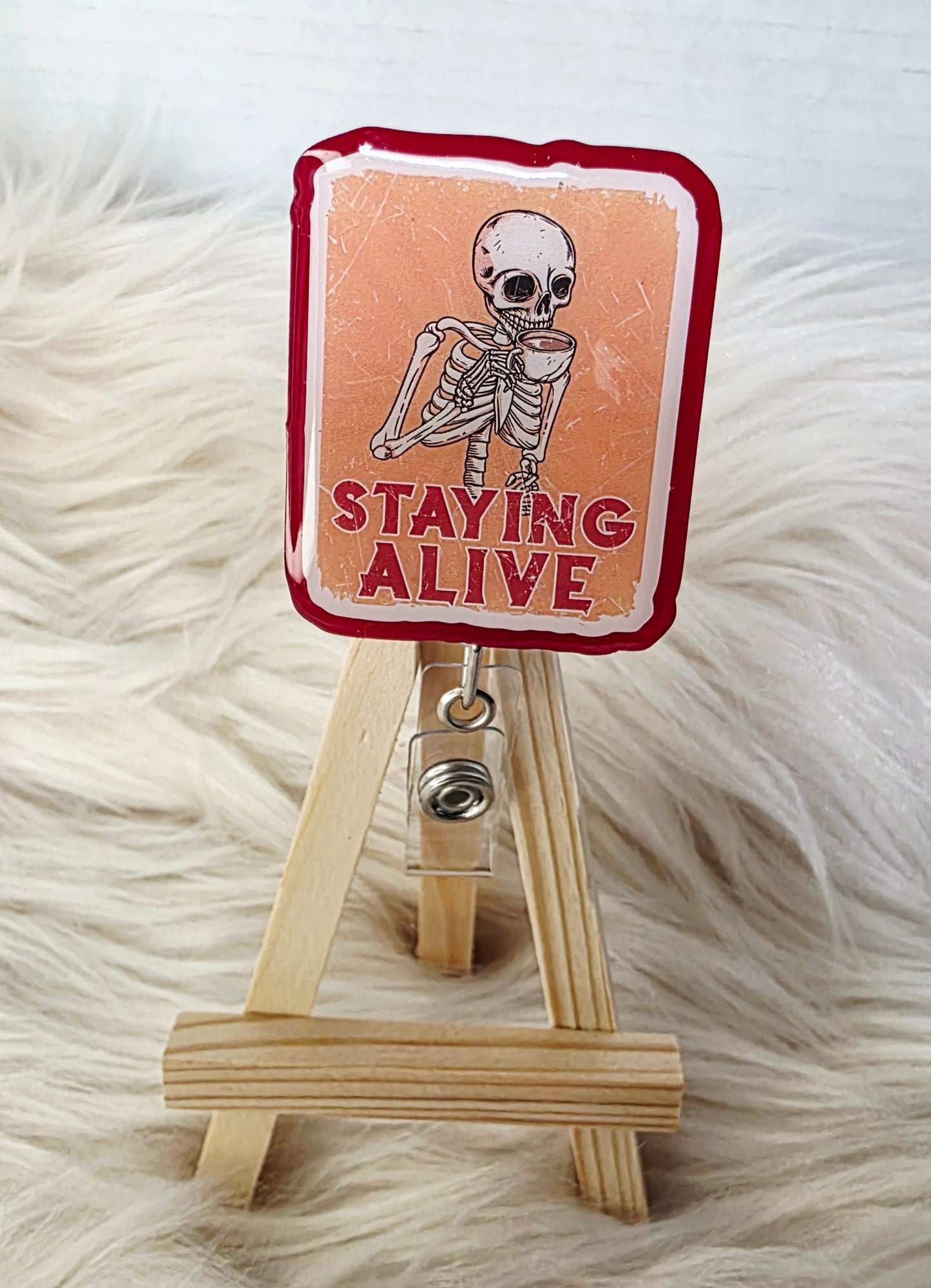 Staying Alive Badge Reel Face