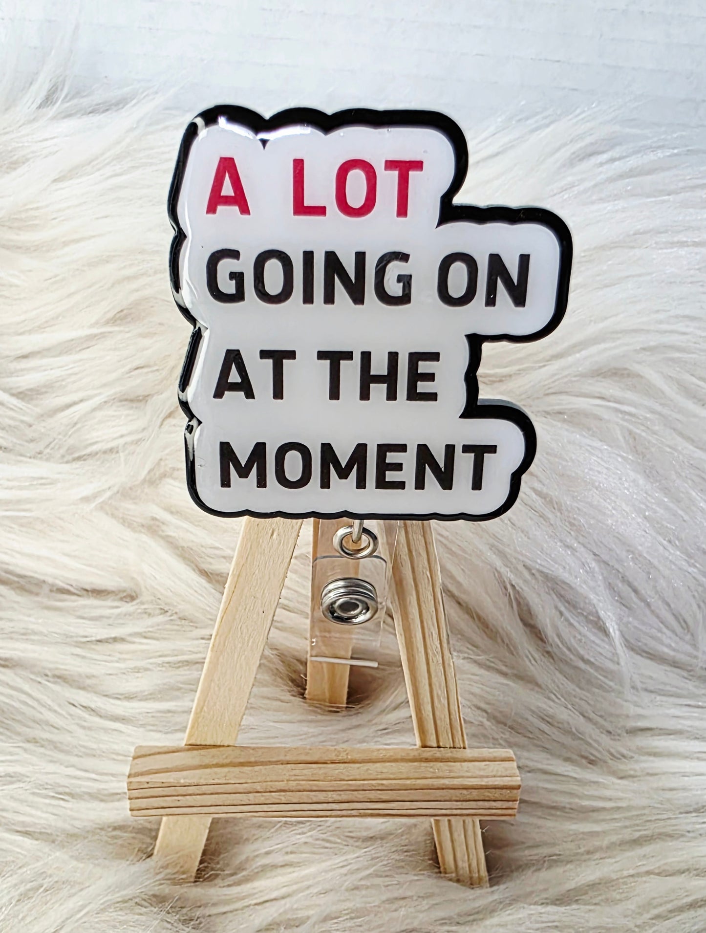 A Lot Going On Badge Reel Face