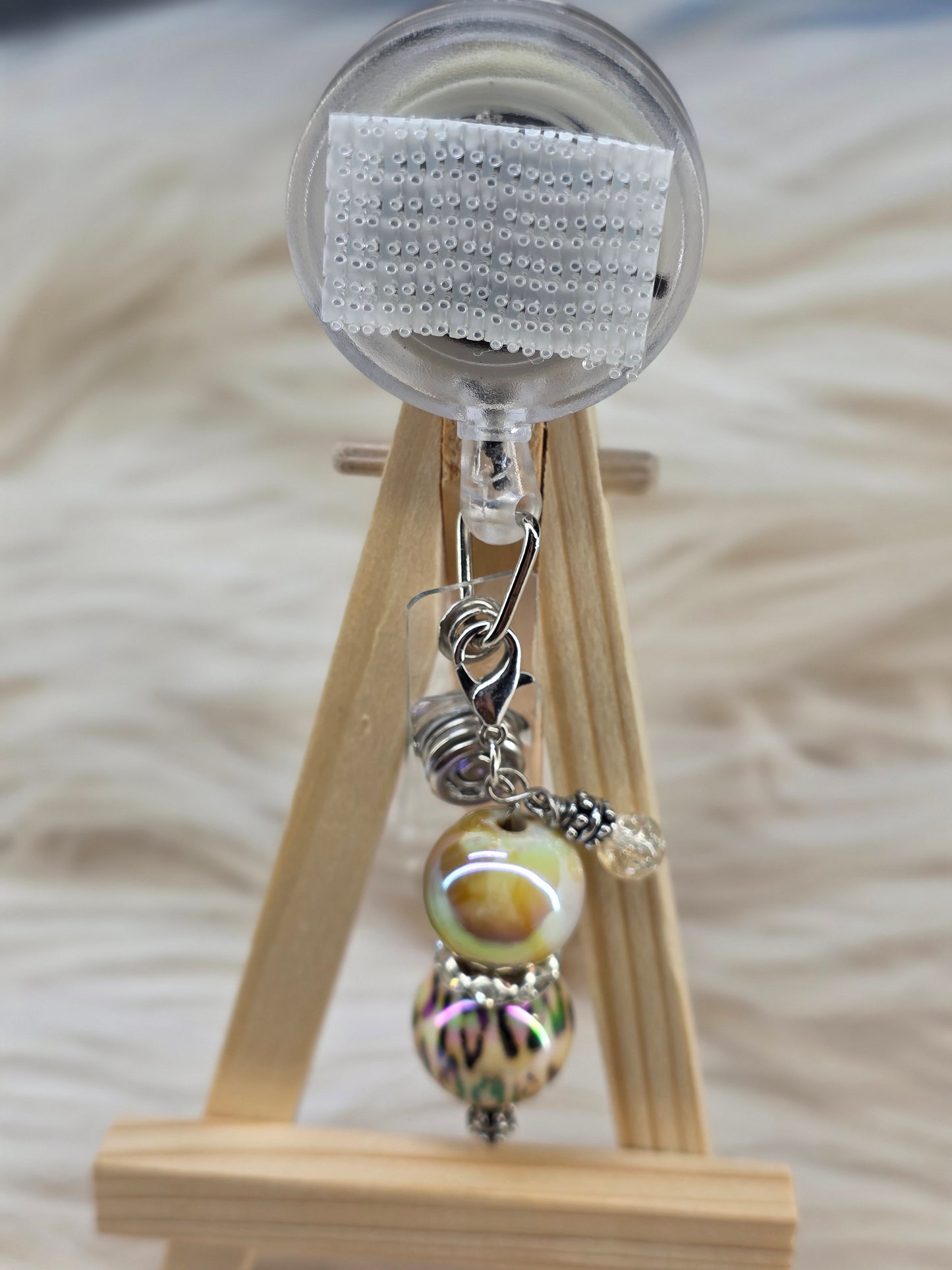Cheetah Badge Reel Charm