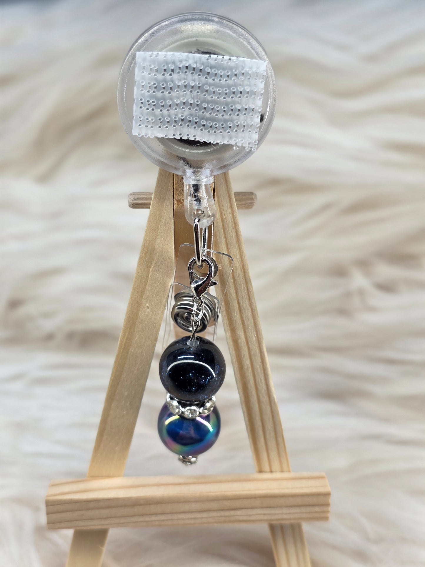 Dark Blue Badge Reel Charm