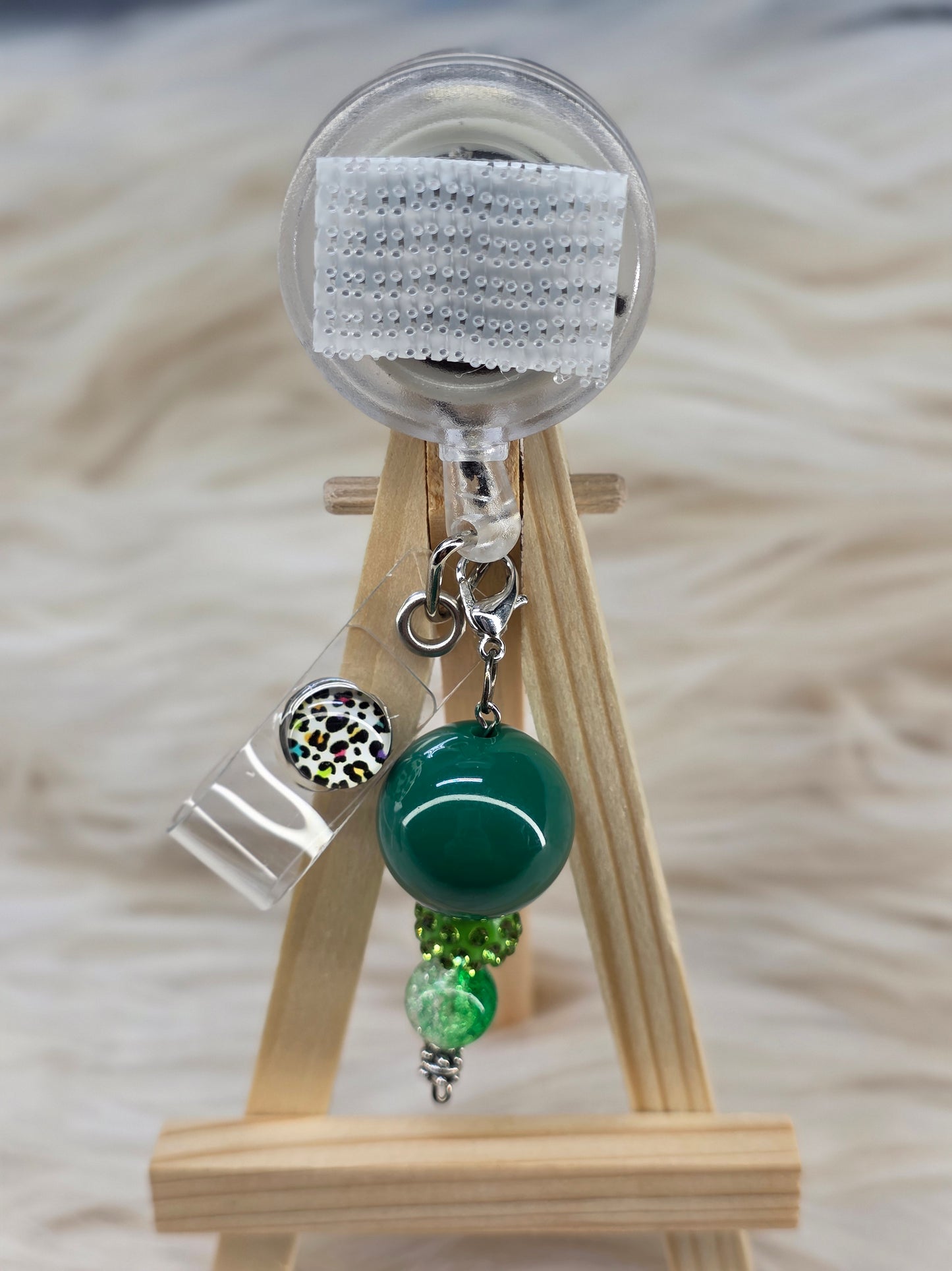 Green Badge Reel Charm
