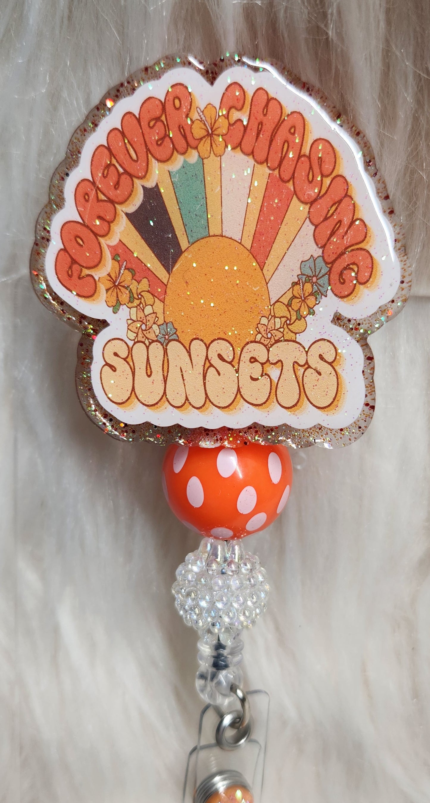 Chasing Sunsets Badge Reel Face