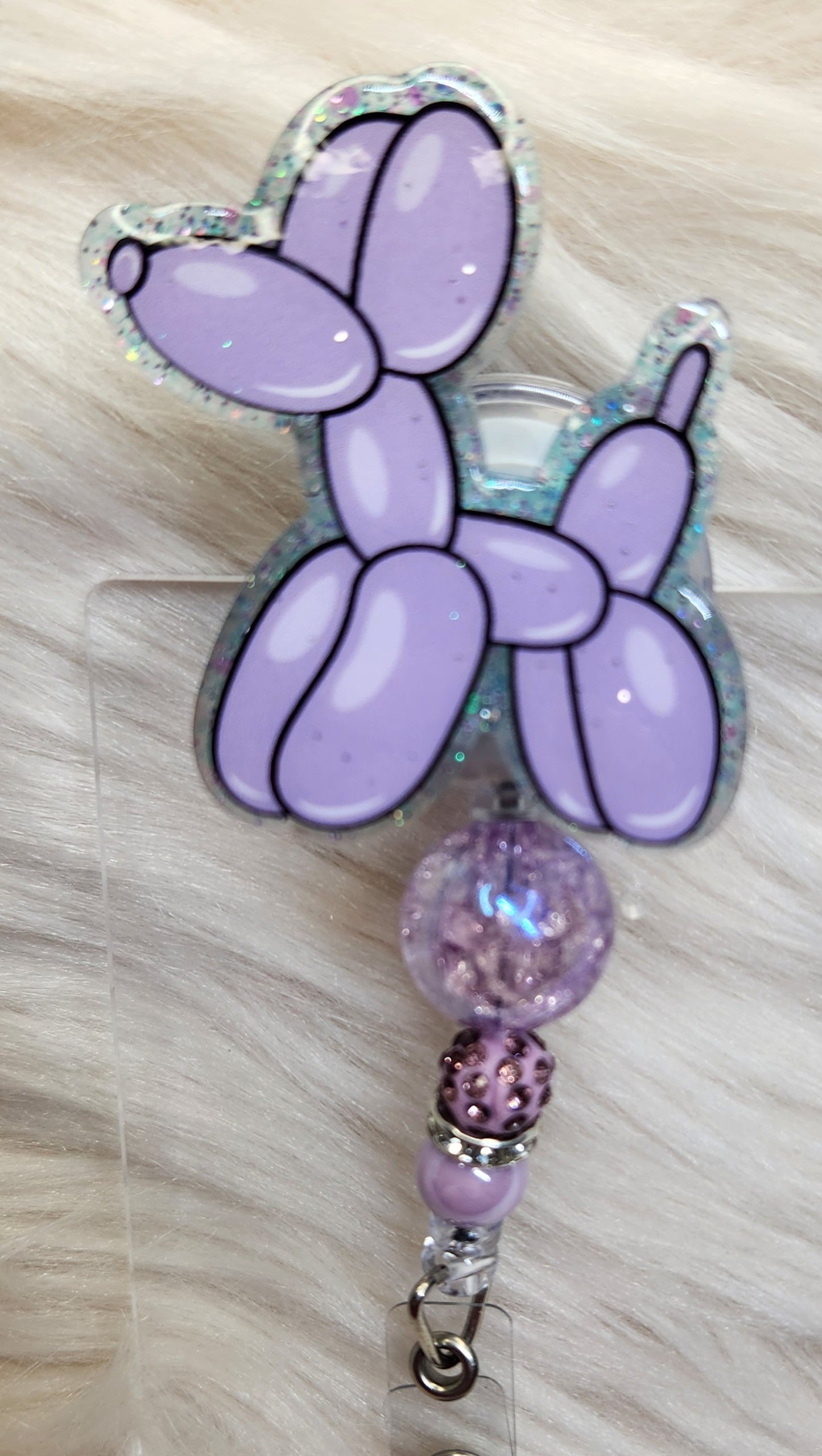 Balloon Dog Purple Badge Reel Face