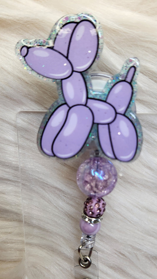 Balloon Dog Purple Badge Reel Face