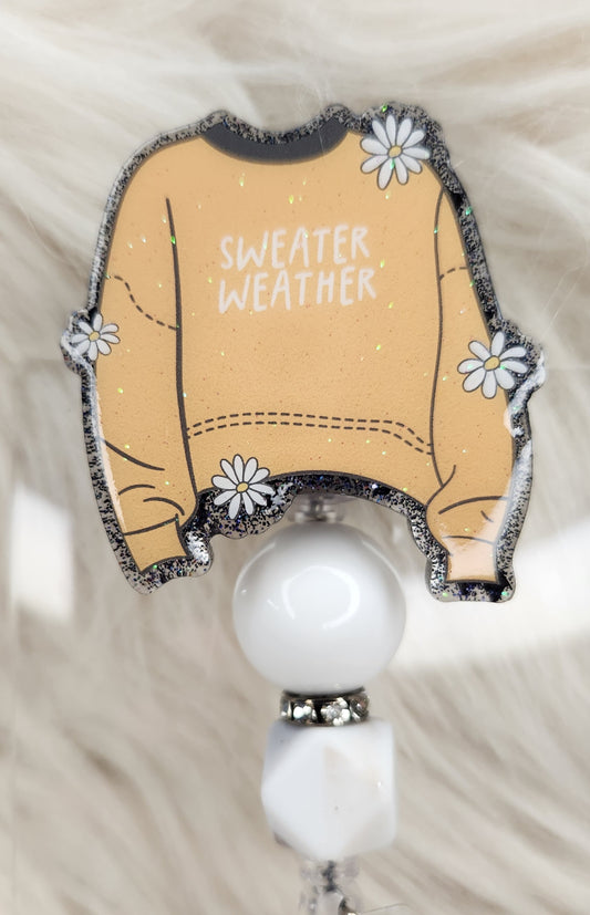 Sweater Weather Badge Reel Face