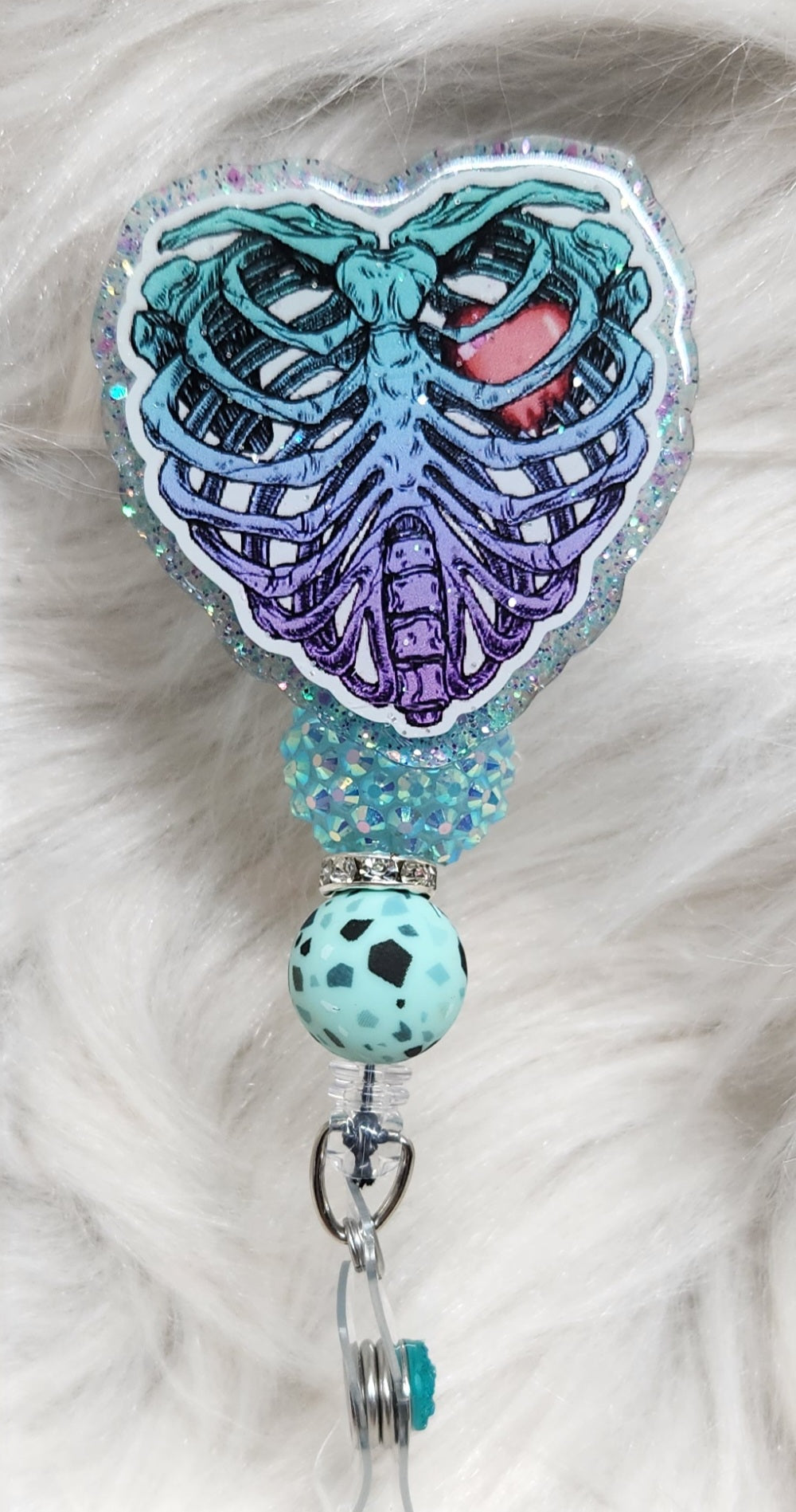 Ribs and heart Badge Reel Face