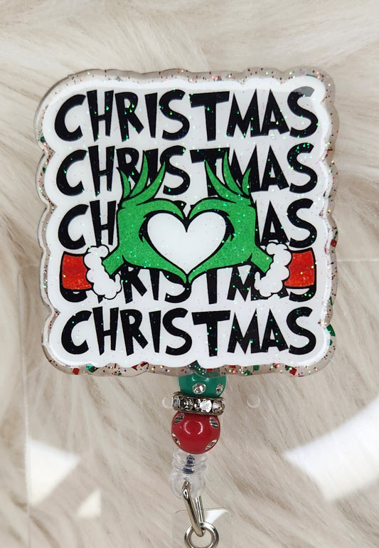 Christmas Green Guy Badge Reel Face