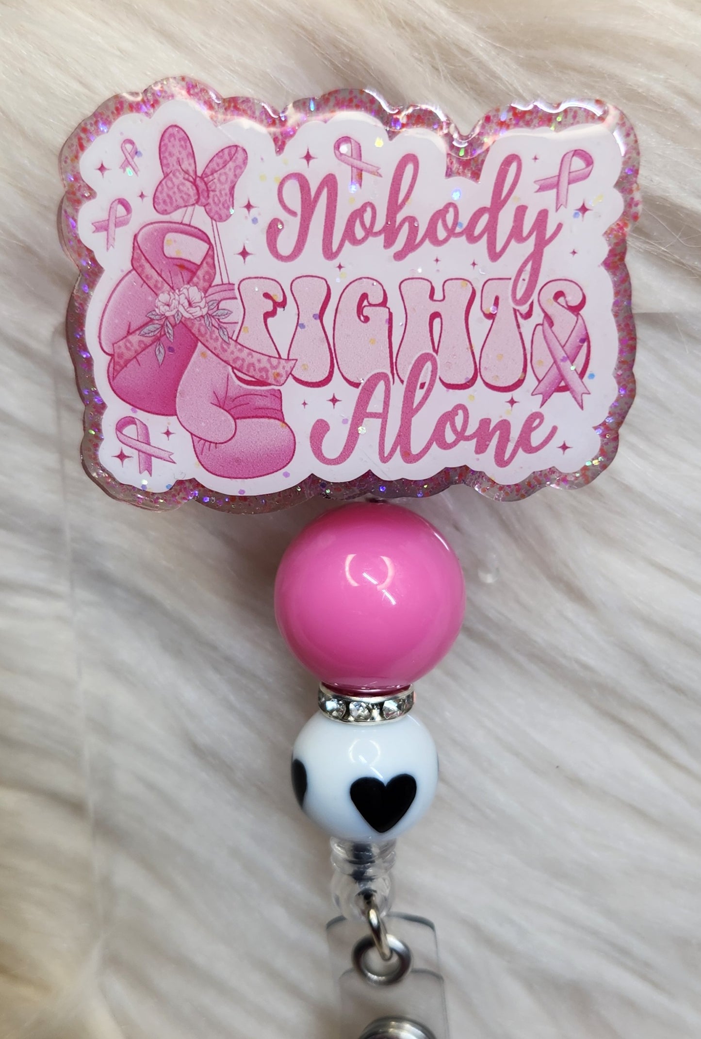 Nobody Fights Alone Badge Reel Face