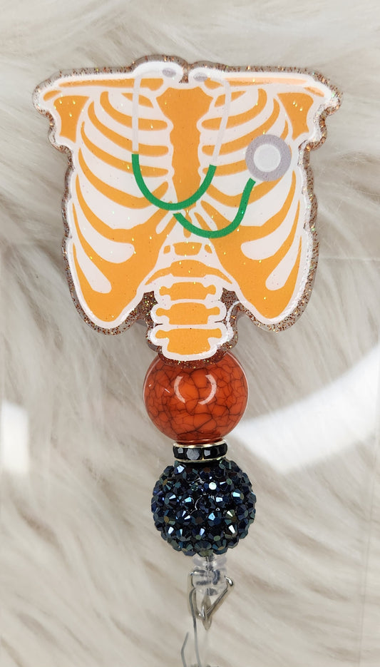 Orange Ribcage Badge Reel Face