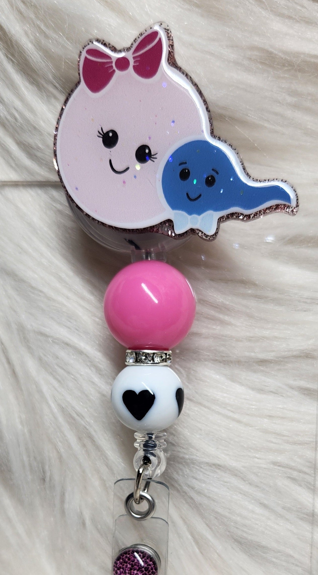 Egg & Sperm Badge Reel Face
