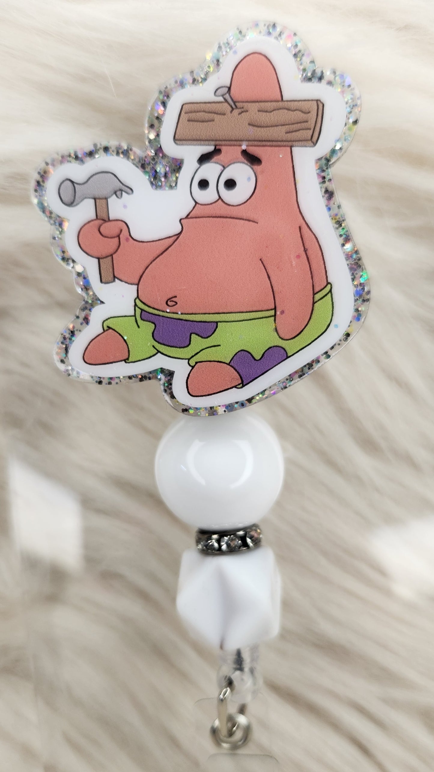 Starfish Man Badge Reel Face