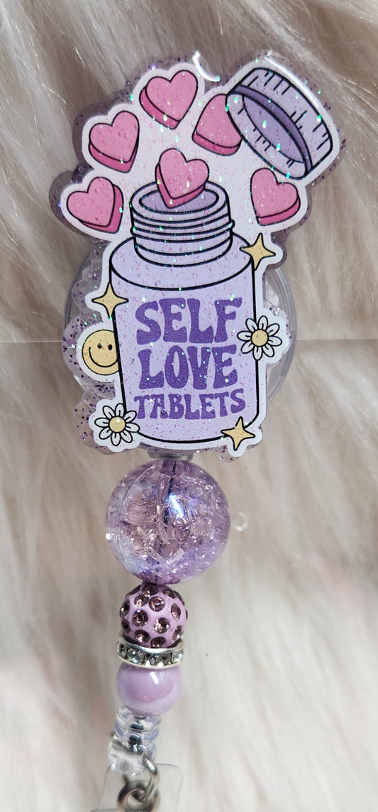 Self Love Tablets Badge Reel Face