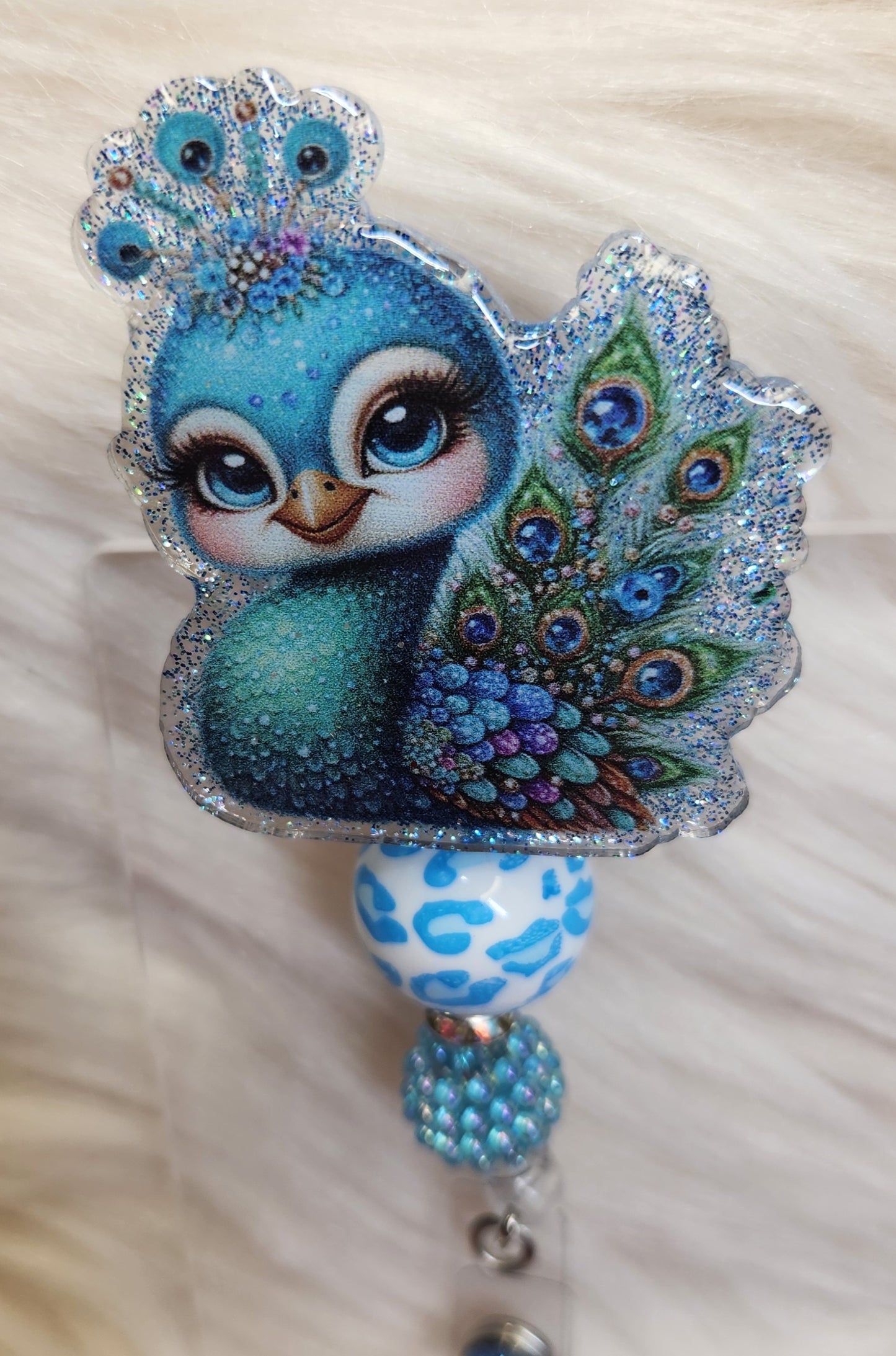 Peacock Badge Reel Face