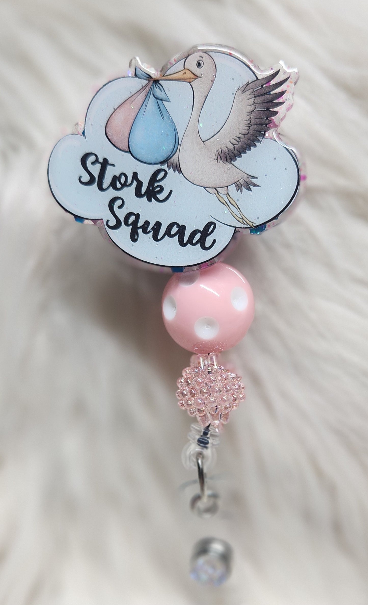 Stork Squad Badge Reel Face