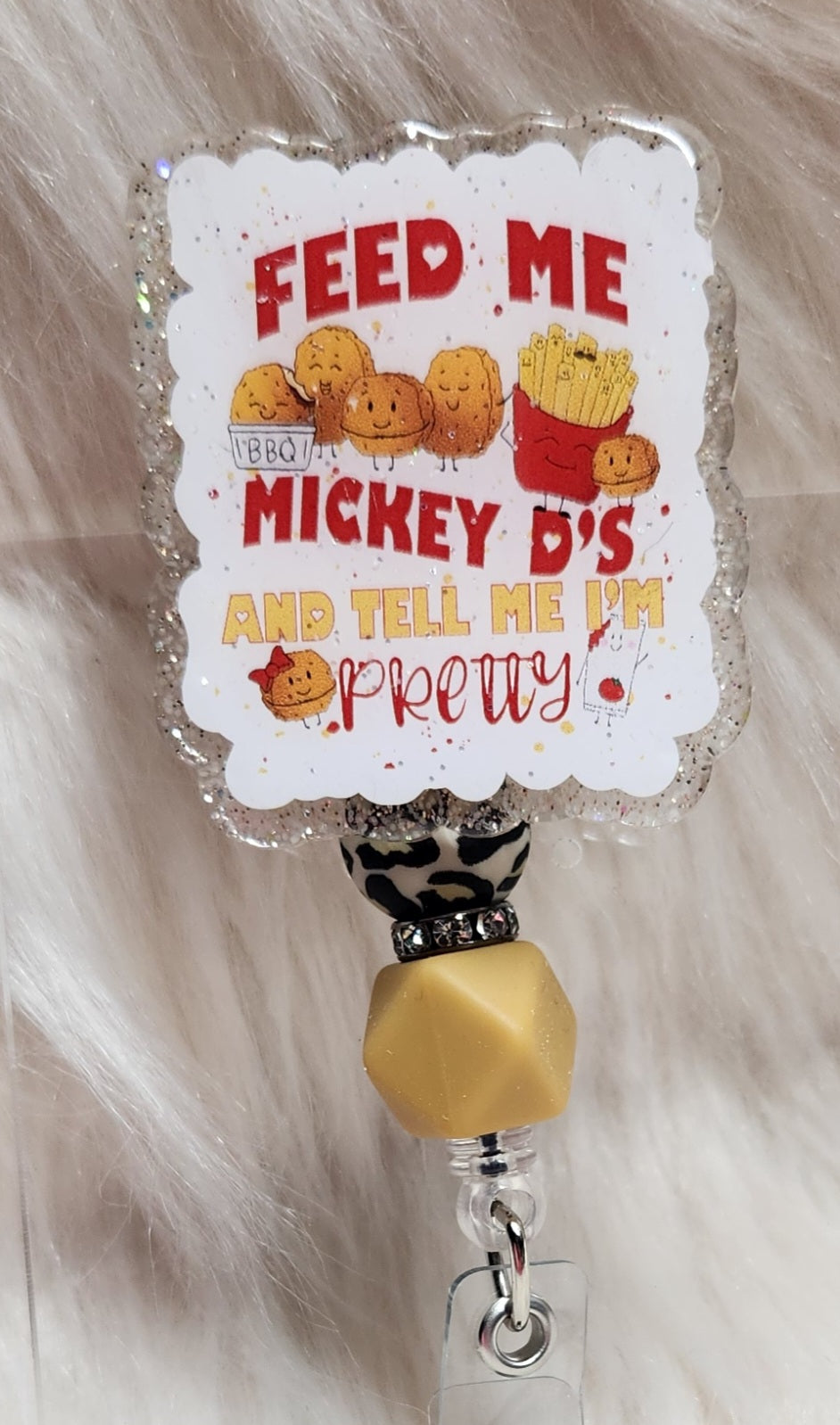 Feed Me Micky D's Badge Reel Face