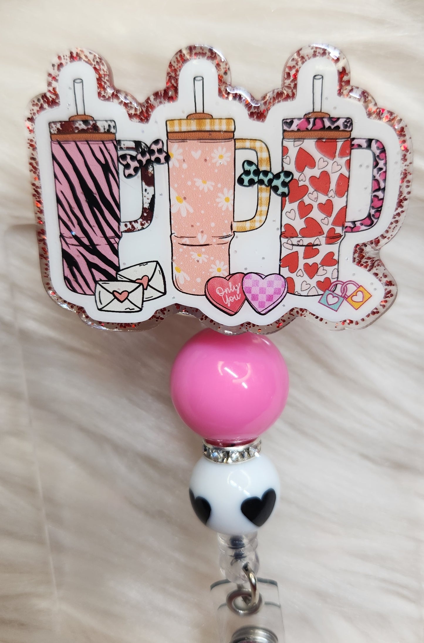 Valentine Cups Badge Reel Face