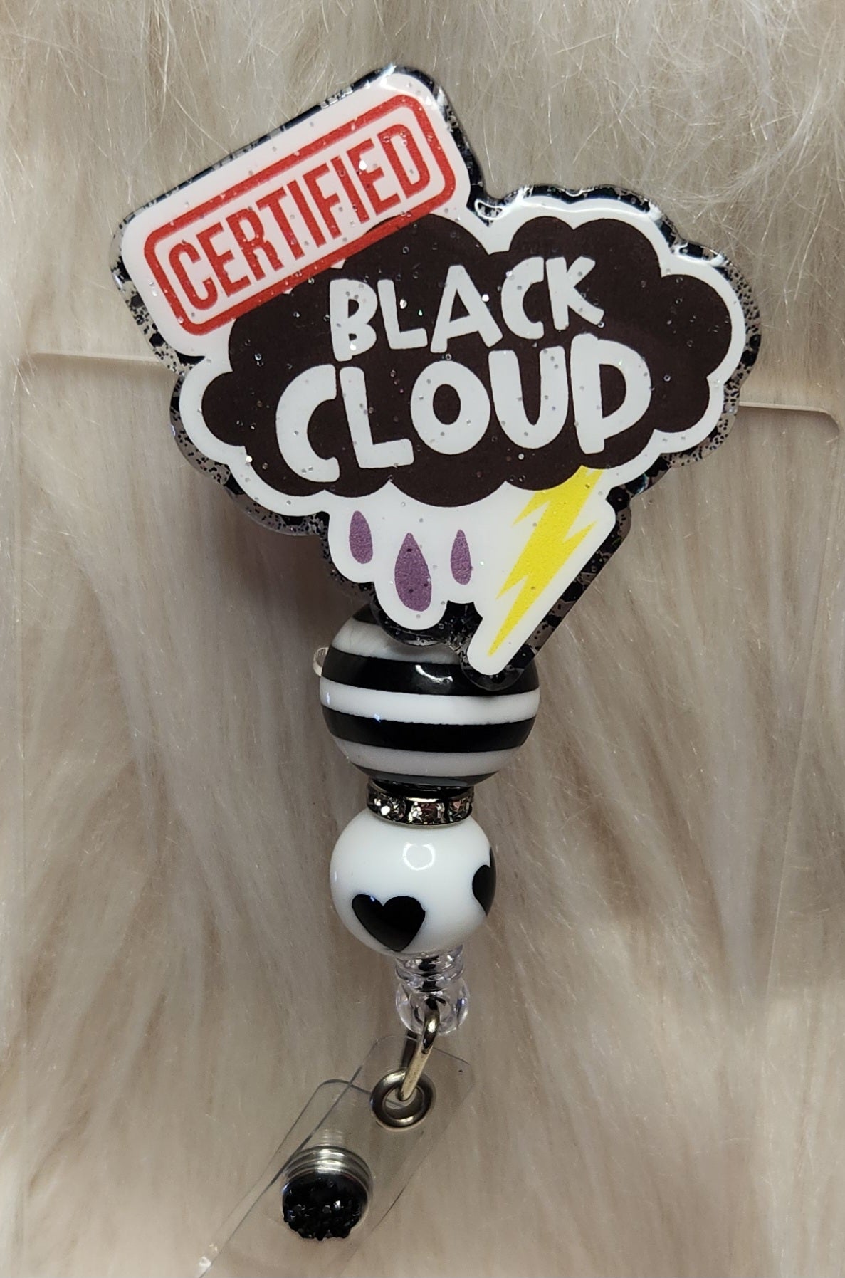 Certified Black Cloud Badge Reel Face