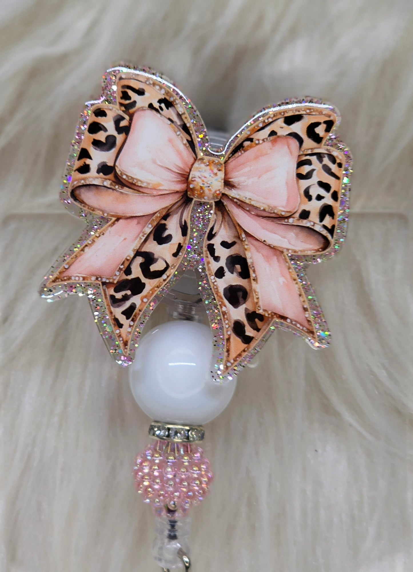 Cheetah Bow Badge Reel Face