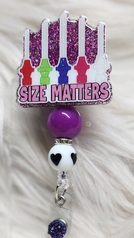 Size Matters Badge Reel Face