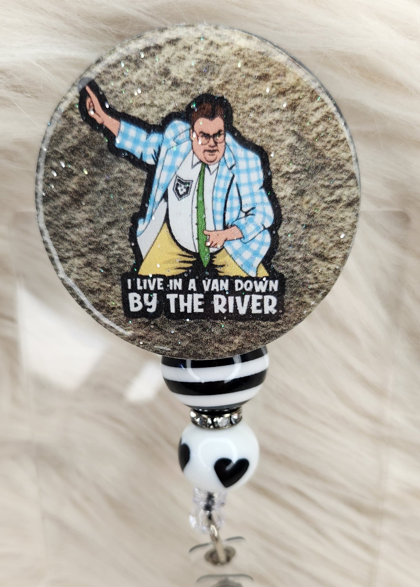 A Van By The River Badge Reel Face