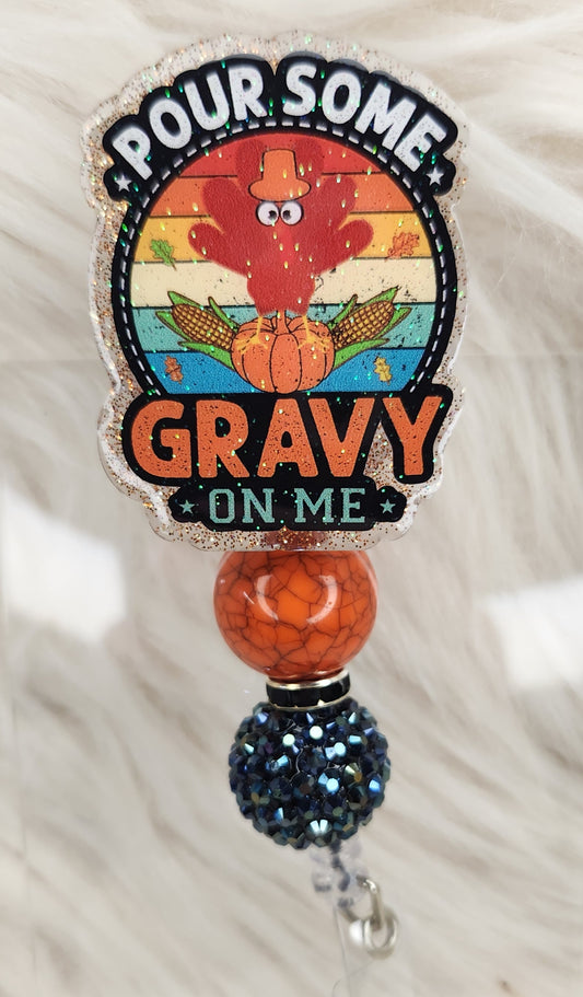 Pour Some Gravy Badge Reel Face
