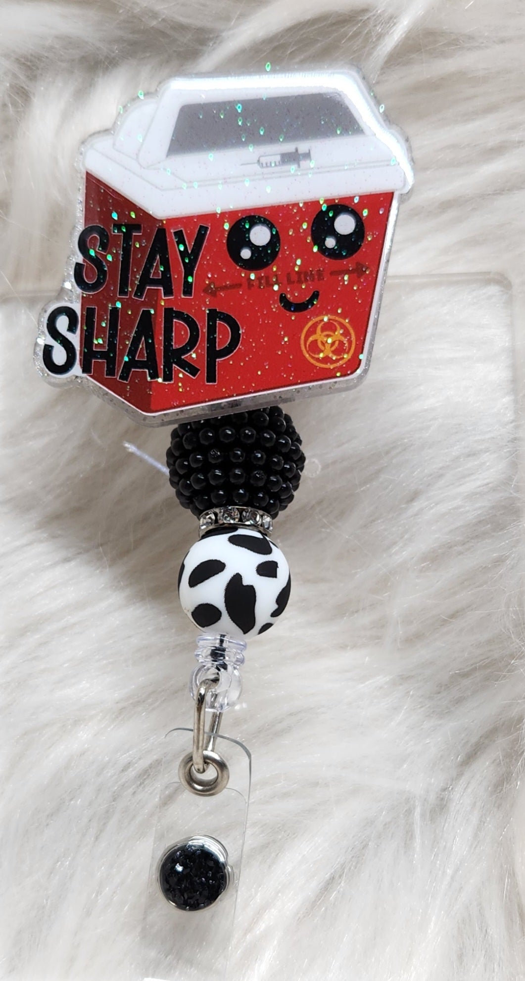 Stay Sharp Badge Reel Face