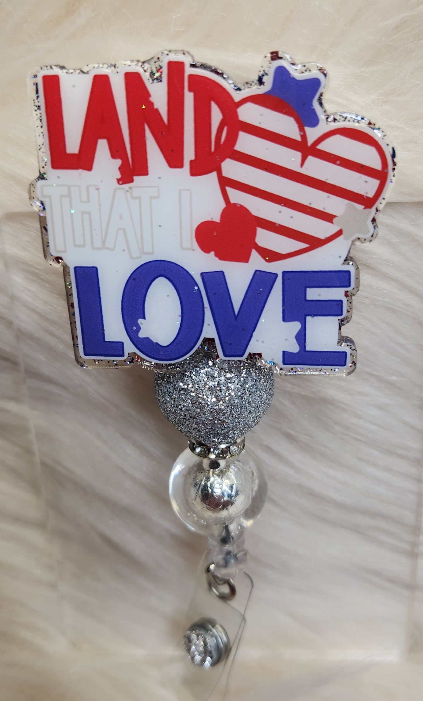 Land That I Love Badge Reel Face