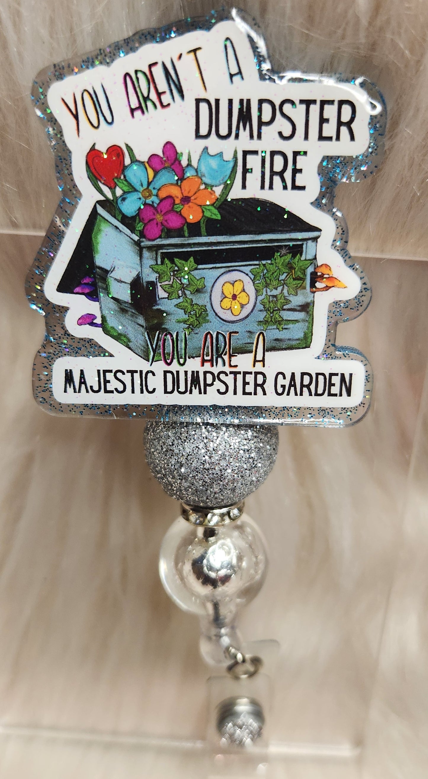 Dumpster Garden Badge Reel Face